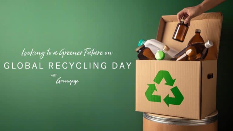 A recycling box on the right with text to the left saying 'Looking to a Greener Future on Global Recycling Day'.